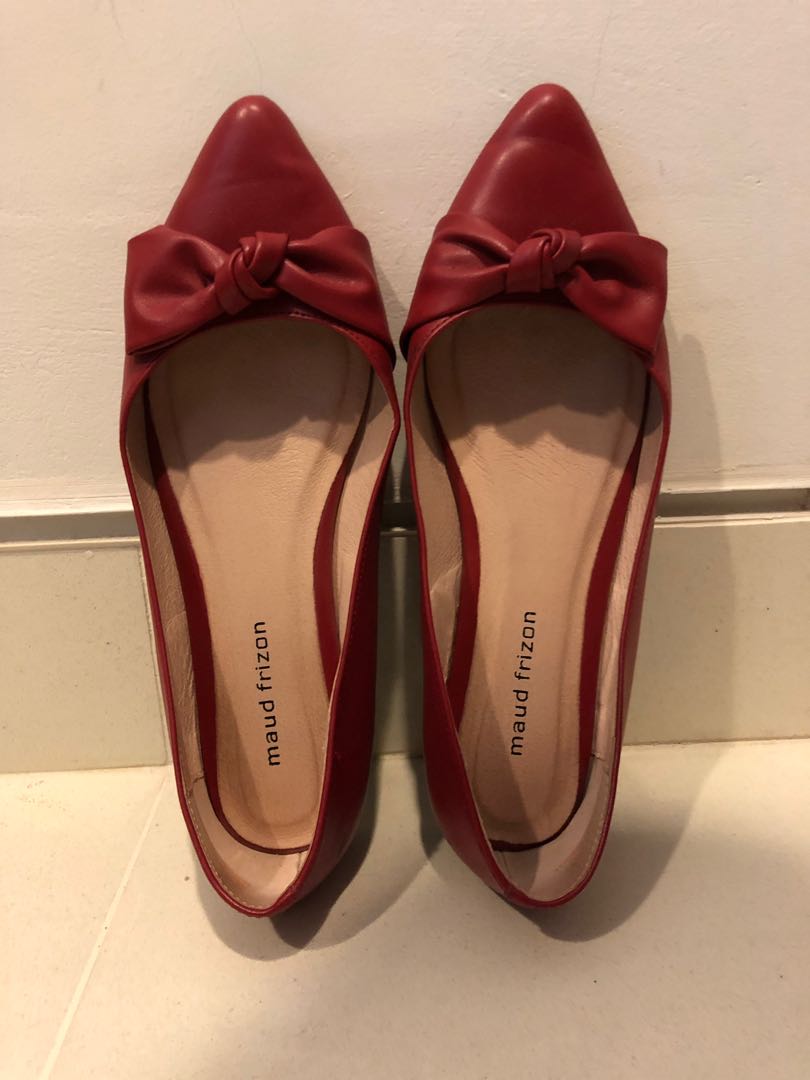 red flat pumps