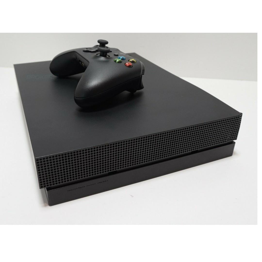 Xbox one X 1TB 99 New
