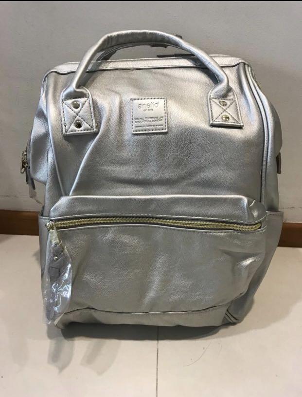 silver backpack leather