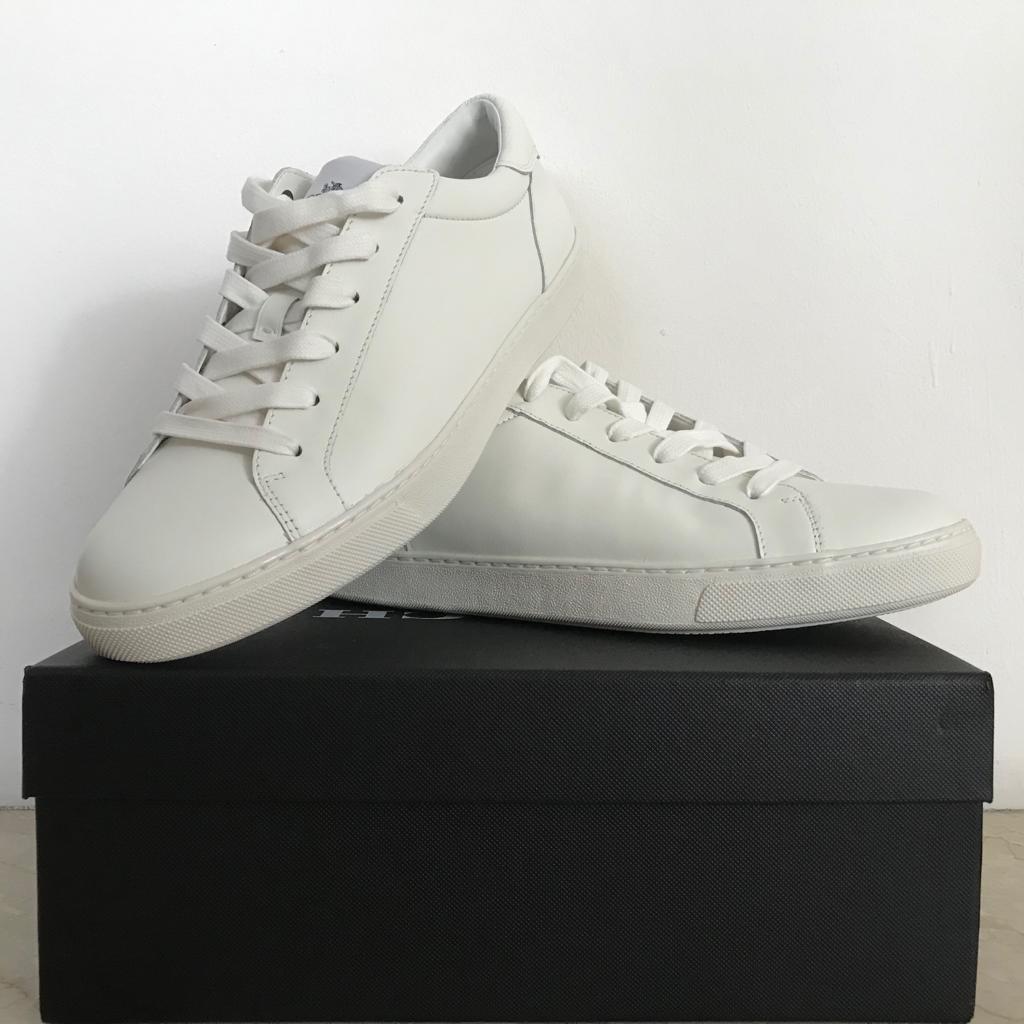 white leather gym shoes