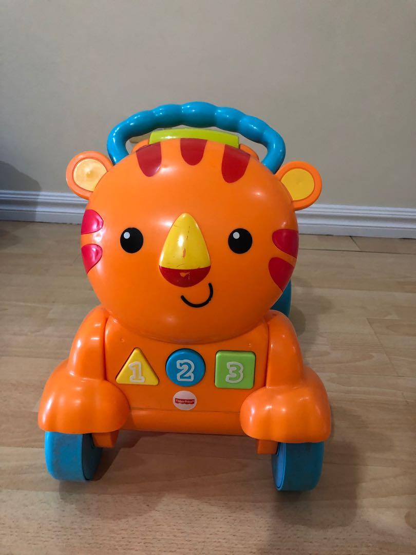 fisher price stride to ride tiger