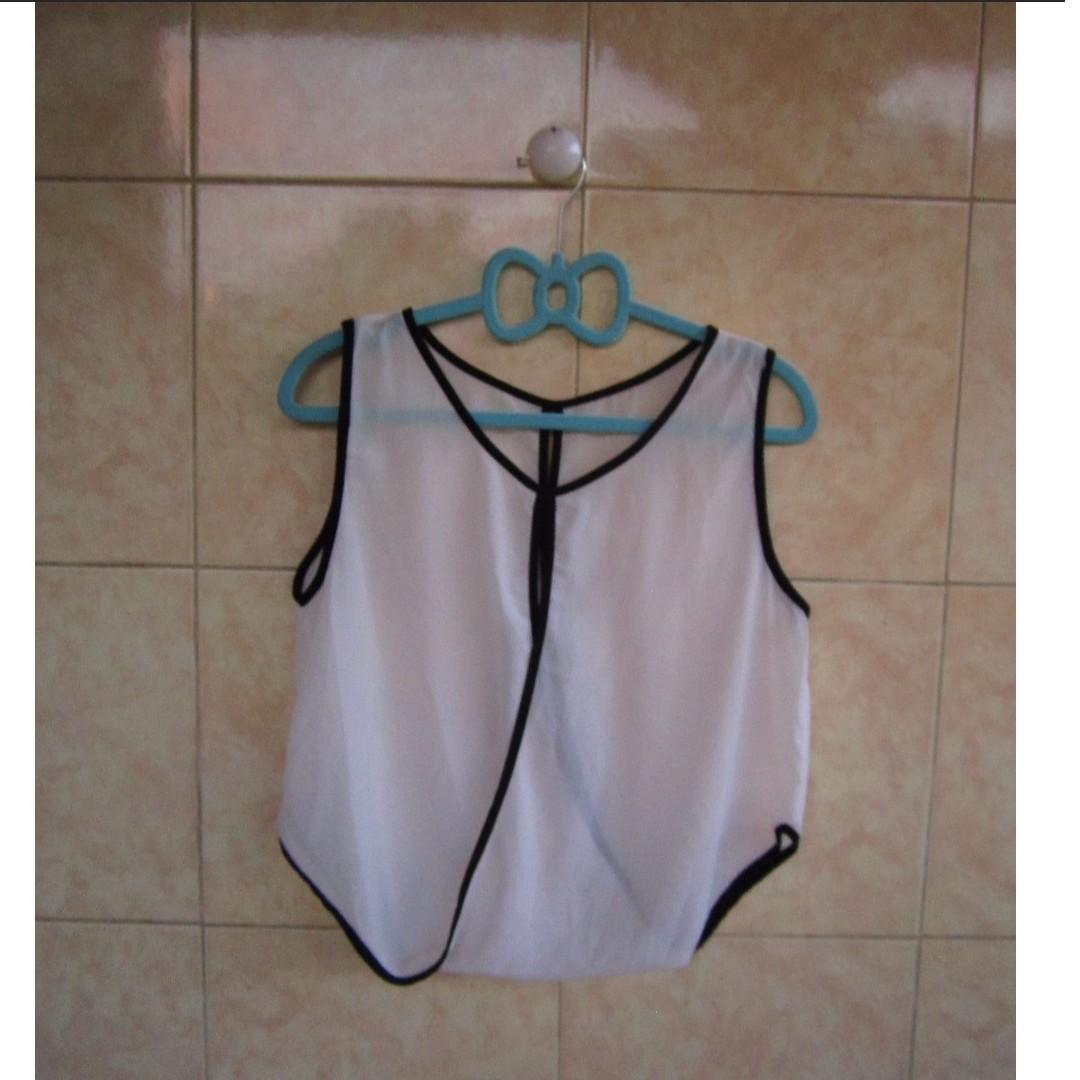 Minimalist Black and White Chiffon Top (Category: Blouses) located in Manila. Submitted by glamouria (Listing ID 244951386, Image 1). Description: Excellent Used Condition Best fits on Small to Medium.