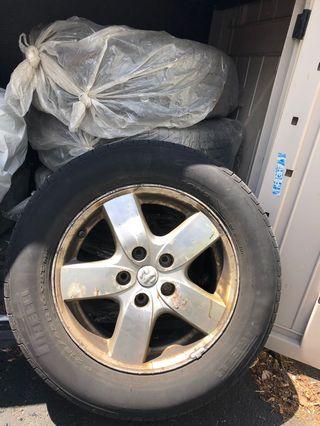 5 Tires and 4 rims