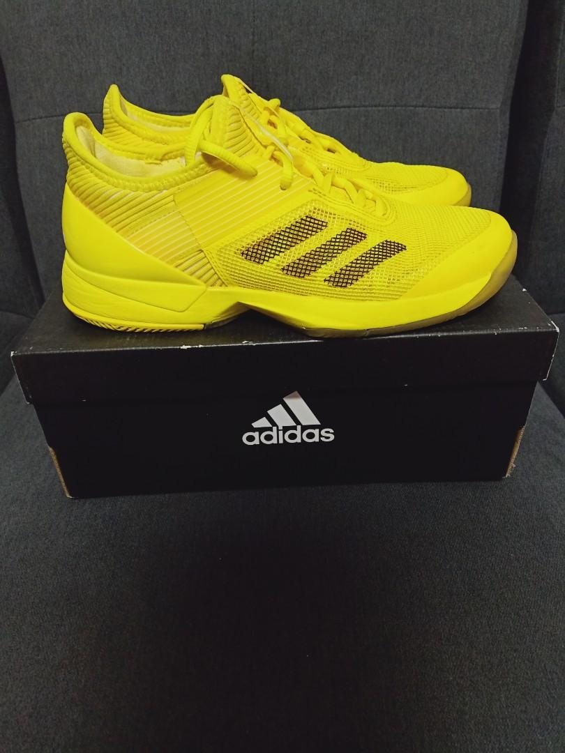 yellow box tennis shoes