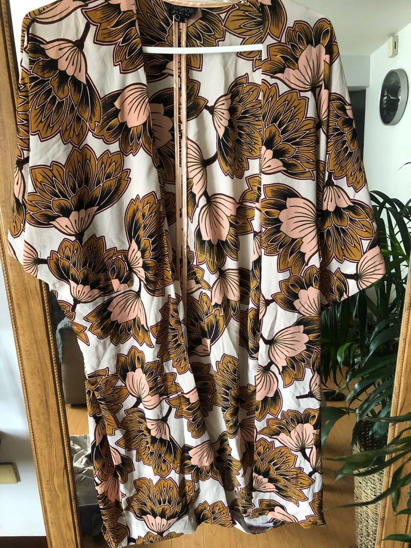 Topshop floral Kimono (Category: Coats, Jackets and Outerwear) located in Makati City. Submitted by curatedthingsph (Listing ID 244970242, Image 1). Description: Used once! Retail price is 4k plus Super nice fabric! Size on tag is US 2 but it fits upto large frames bec it’s a cover up .