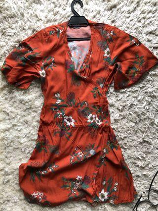Tasi Travels Wrap Dress