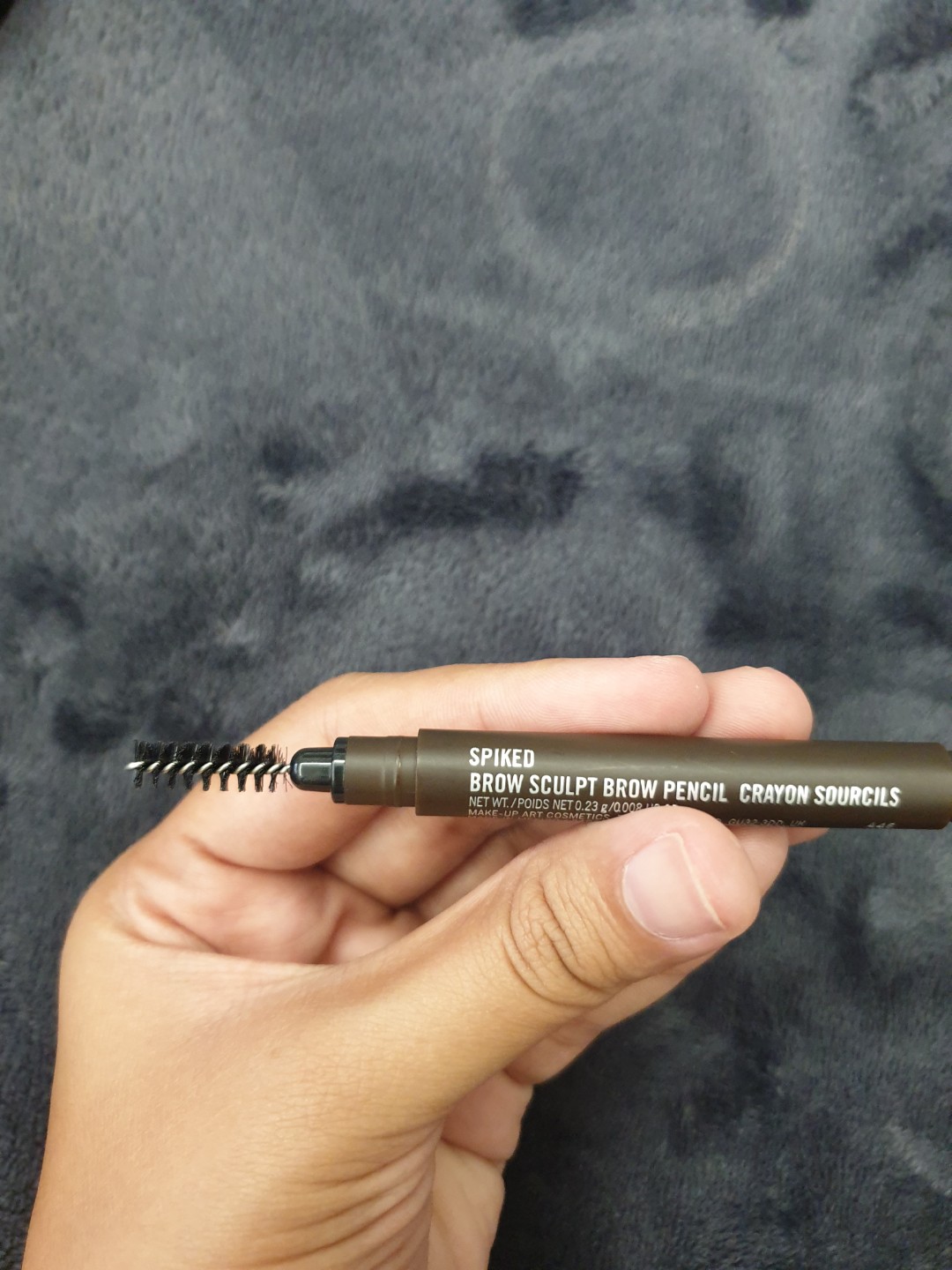 Mac eyebrow pencil spiked or stud