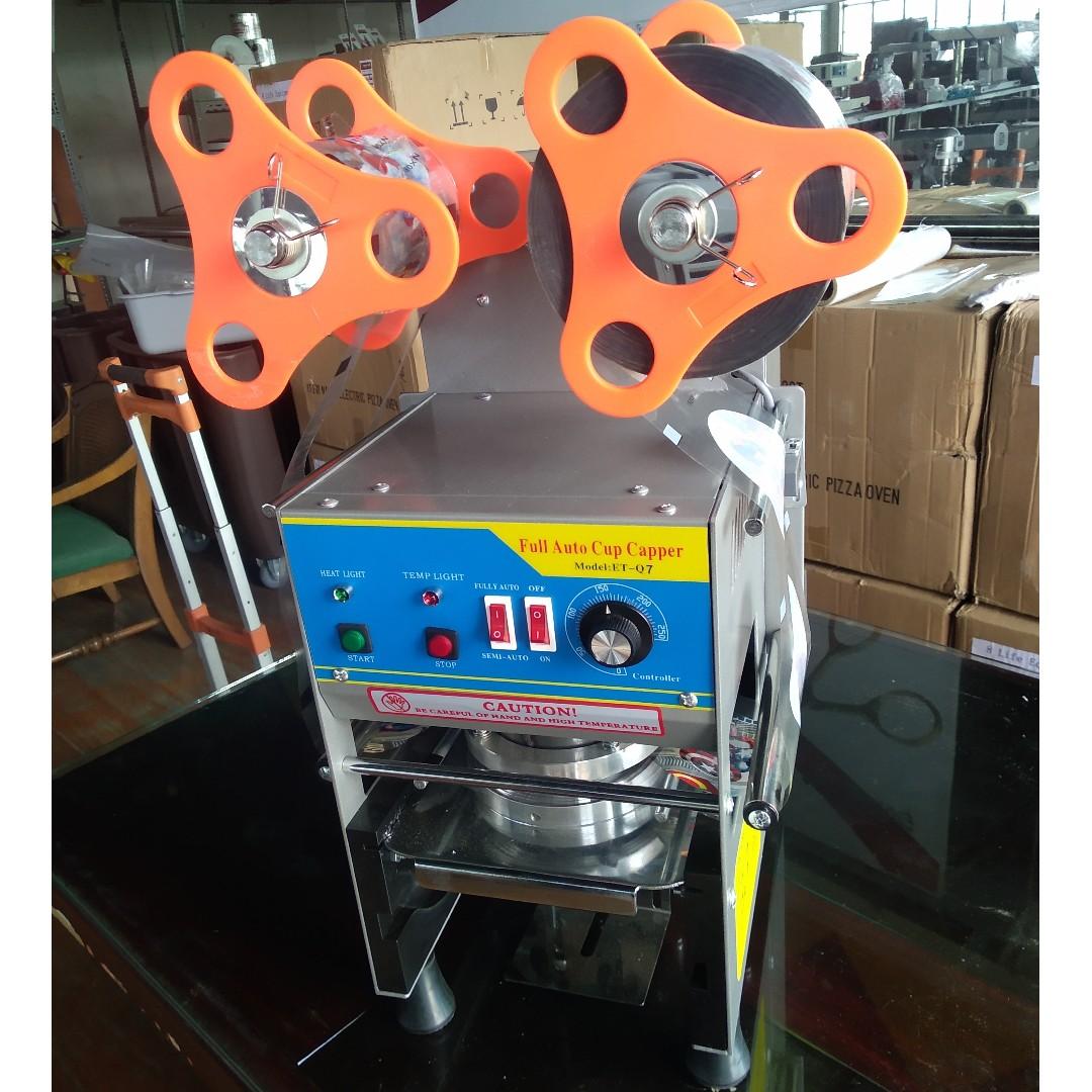 Fully Automatic Cup Sealer Machine (Category: Coffee Machines & Makers) located in Valenzuela. Submitted by eightlife_equipment (Listing ID 245309754, Image 2). Description: FREE 1 roll of sealing film worth P500, Auto load auto seal auto roll OTHER AVAILABLE PRODUCTS: • Beverage Dispenser • Blender • Milk Shaker • Milk Tea Barrels • Cup Sealers - Manual/Automatic/Semi-Automatic • Cup Sealing Films • Chocolate Fountain • Tray Sealer • Rossetti Co