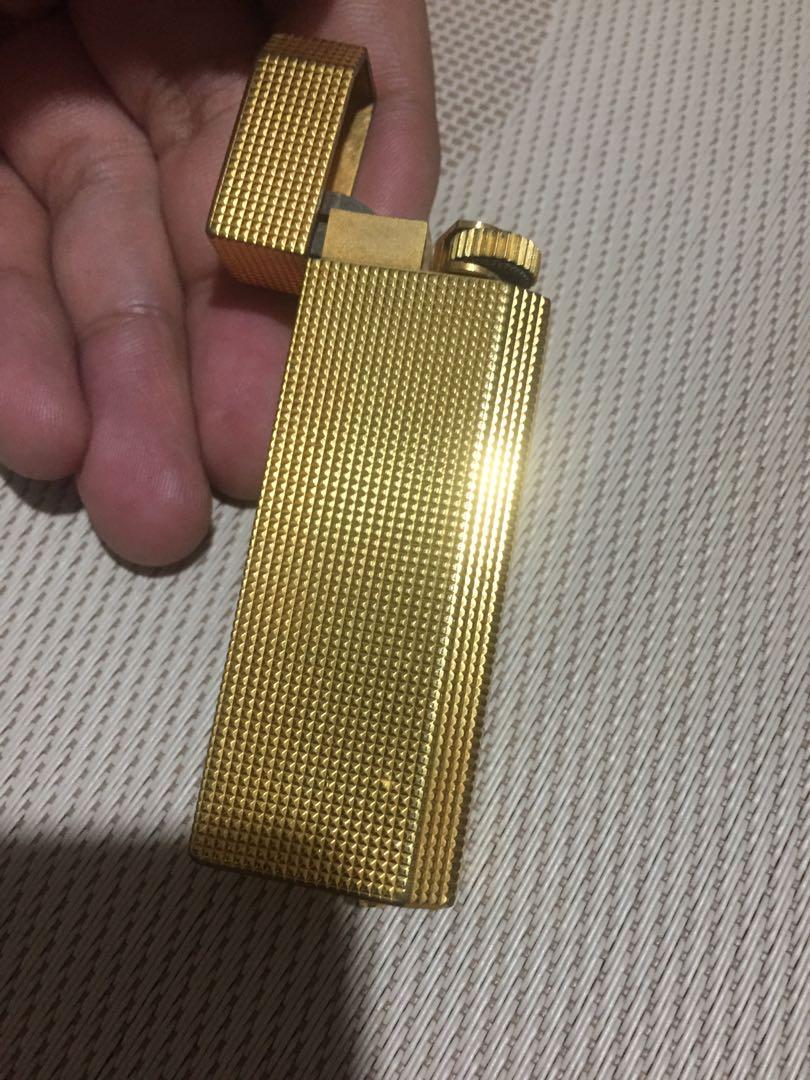 Cartier Lighter 5 Faces Gold (Category: Luxury Accessories) located in Pasay City. Submitted by derekuygo (Listing ID 245652278, Image 2). Description: Cartier lighter 5 faces in gold of the years 80 The lighter has been completely overhauled and is therefore guaranteed original but theres a malfunction on upper( need oil i think) and bottom part based on picture there a defect not using it anymore kindly pm me for interesred 09270094318 .
