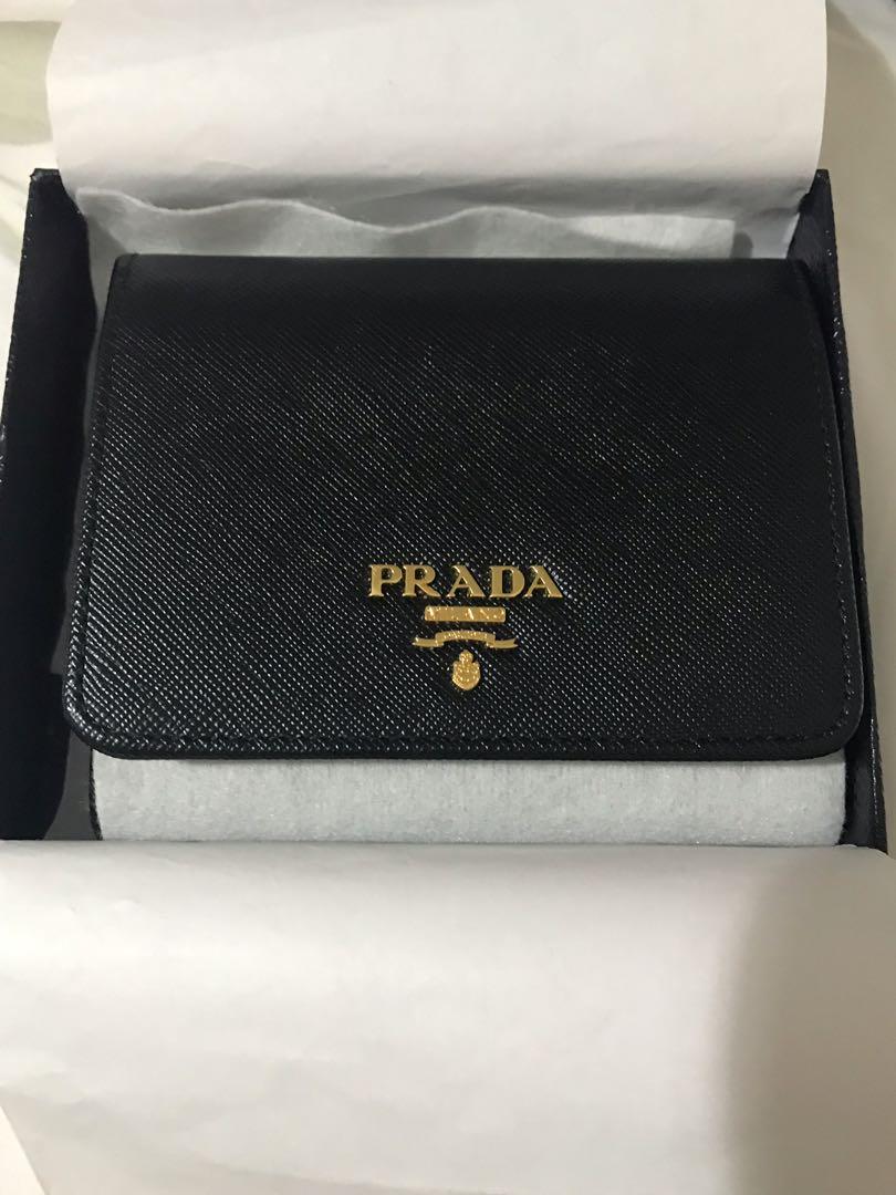 Prada Trifold Wallet, Luxury, Bags & Wallets on Carousell