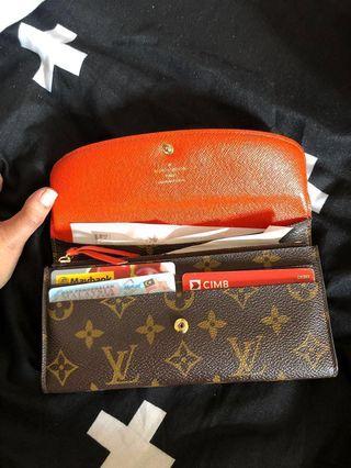 louis vuitton emilie monogram wallet (piment)