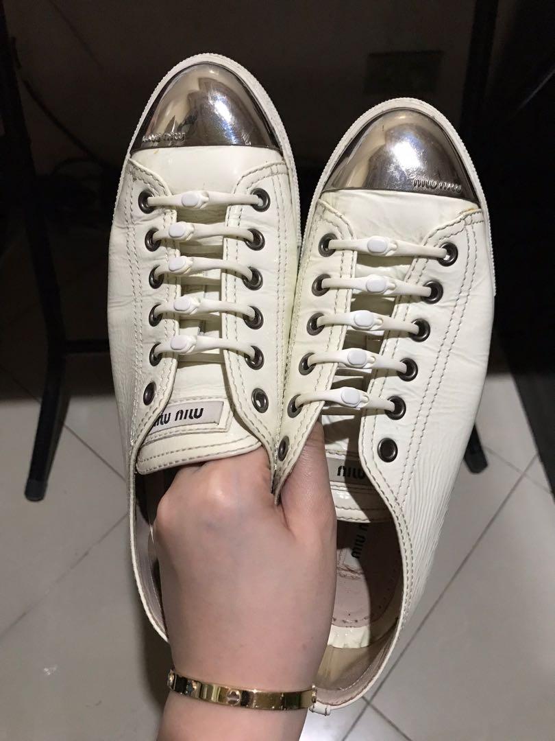 Miu Miu White Patent Sneakers (Category: Sneakers) located in Pasig City. Submitted by elarivera (Listing ID 245812536, Image 1). Description: .