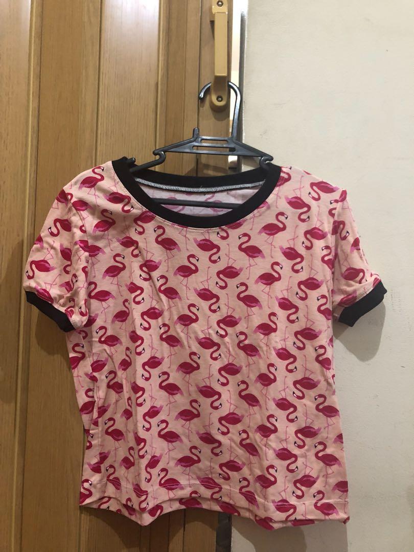 Pink Flamingo Print Crop Top (Category: Sleeveless) located in Quezon City. Submitted by heyjonlineshop (Listing ID 245755506, Image 1). Description: Cute top, fits xs,s frame..