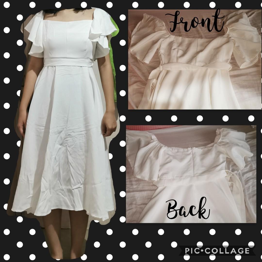 White Dress (Category: Dresses) located in Paranaque City. Submitted by agadeclutter (Listing ID 245787043, Image 2). Description: See last pic for picture on mannequin (from store) Can also be off shoulder Used once In good condition except for a tiny stain on the ribbon that can be easily hidden (baliktarin mo lang or ilagay sa likod hahaha) - see second to the last pic Free size According to store, can fit up to 34" bust, 30"waist, 39" length 