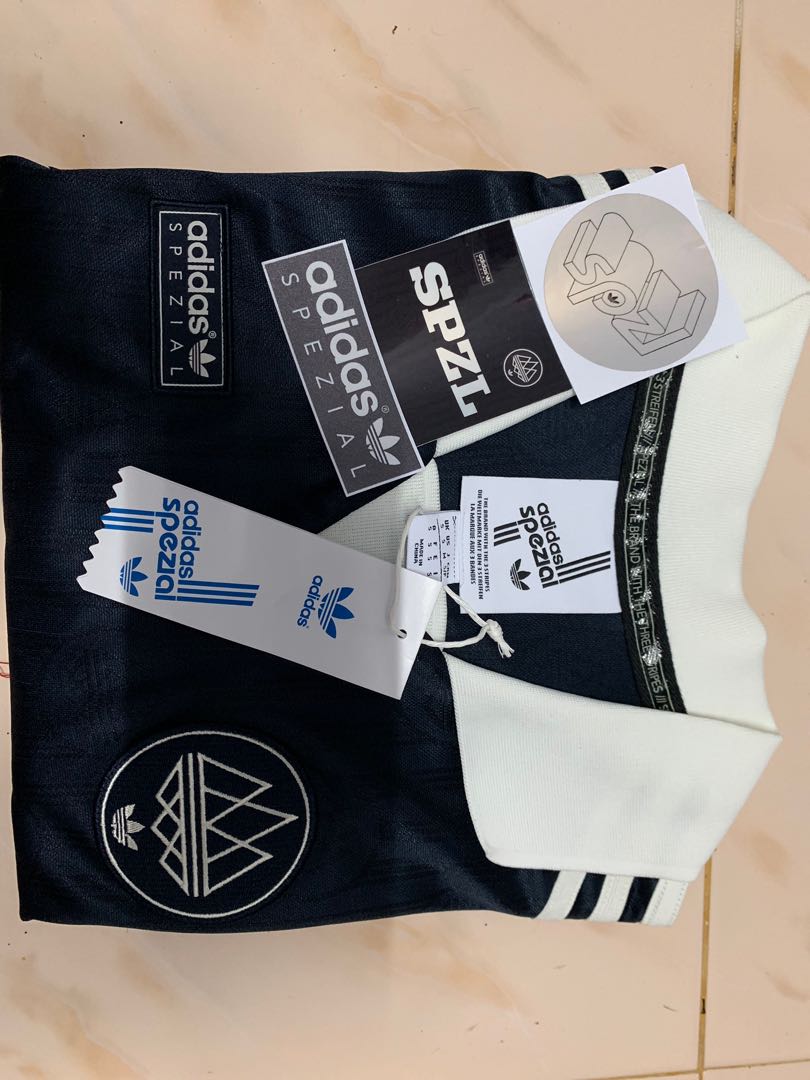 paper coin argument Adidas Spezial Lymwood Jersey, Men's Fashion, Tops & Sets, Tshirts & Polo  Shirts on Carousell