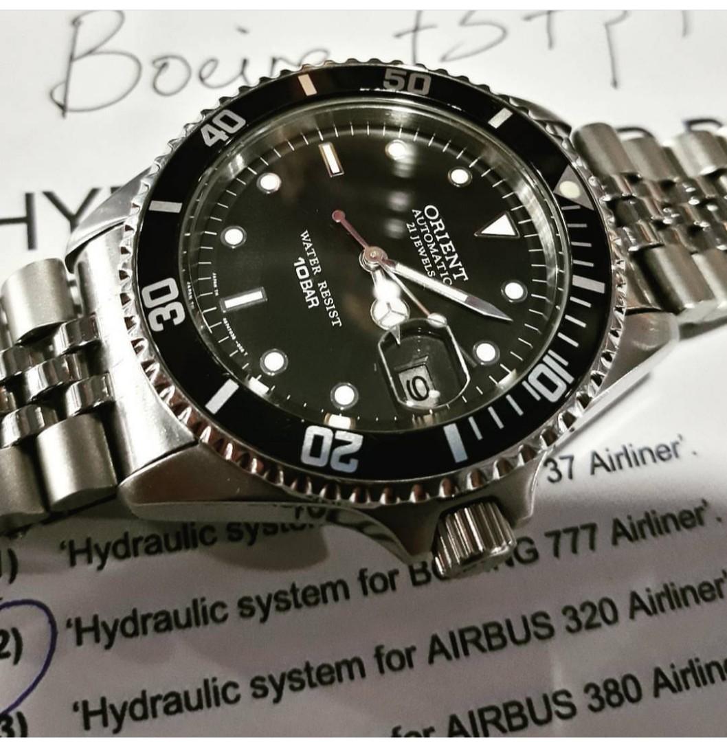 Orient submariner outlet homage