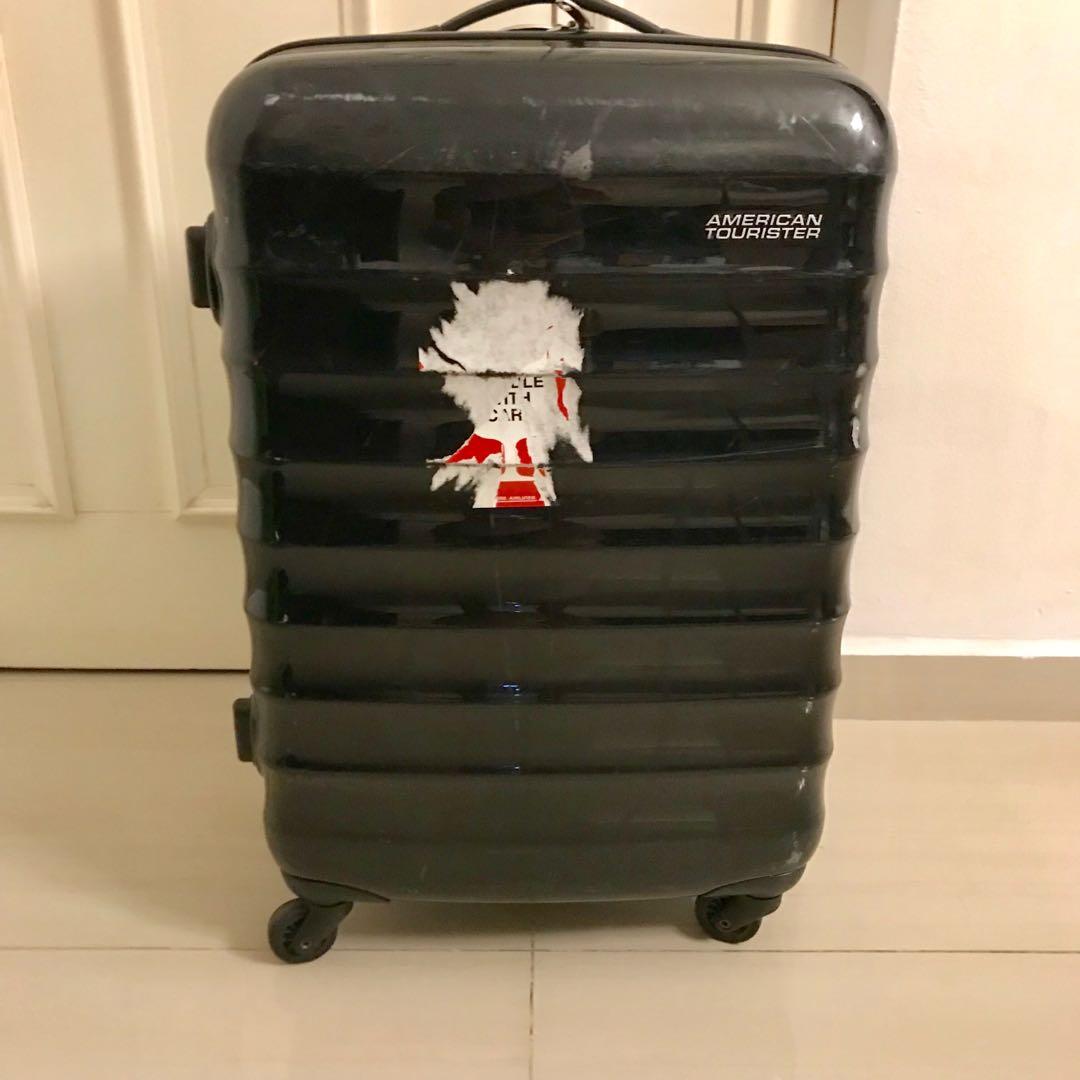 american tourister paralite spinner