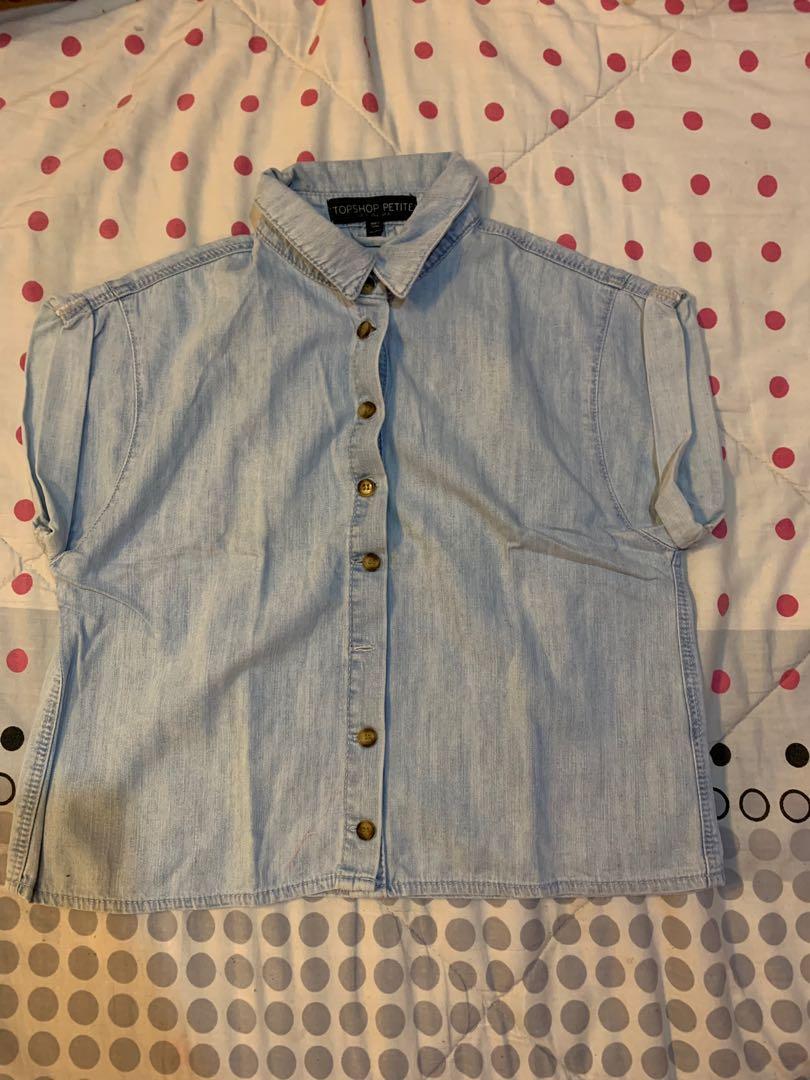 Button down top (Category: Blouses) located in Manila. Submitted by rkpreloveditems (Listing ID 246277490, Image 1). Description: Legit Topshop Used only once Still in good condition.