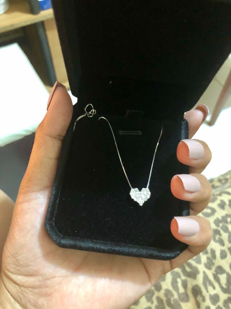 Heart Necklace Japan white gold (Category: Necklaces) located in Santa Rosa. Submitted by sashamonster (Listing ID 246223809, Image 1). Description: Authentic 18K White gold necklace with half carat illusion heart pendant Authentic Natural Diamonds *rarely used GOOD AS NEW .