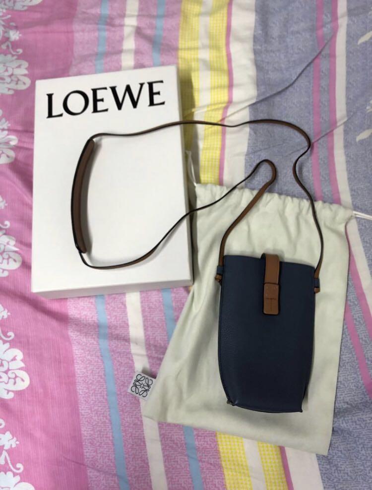 Loewe pocket bag (Category: Bags & Wallets) located in Sydney. Submitted by pshei (Listing ID 246316265, Image 1). Description: Authentic Loewe pocket, special colour and worn it twice only, Pretty new. Already out of stock in the shop. Come with bag, dust bag and box. Could also provide you the receipt.