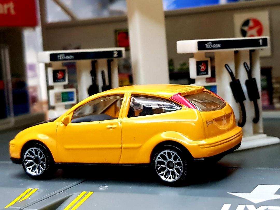 Matchbox Yellow & Rust Orange FORD FOCUS Set of 2 (Category: Vehicle & Diecast Models) located in Quezon City. Submitted by arkistoragebox (Listing ID 246370347, Image 2). Description: Matchbox 1/64 Yellow & Rust Orange FORD FOCUS Set of 2 - P250.00 ***Set sale only, No breaking of the set Both are loose but in very mint condition. They were stored in a loose car case and were never played with. Please refer to attached photos for actual item con