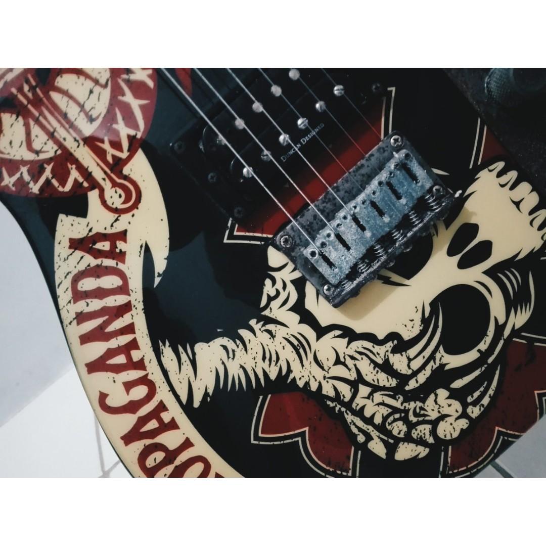 Squier by Fender Obey Telecaster (Category: Musical Instruments) located in Manila. Submitted by mywardrobeonsale (Listing ID 246237243, Image 2). Description: This Squier Telecaster Electric Guitar with graphics by artist Shepard Fairey is a hot, high-powered Telecaster equipped with a bridge humbucker and a single coil neck pickup. Oxidized worn hardware gives this guitar the look of a veteran. Features: - Agathis body - Maple neck with rosewoo