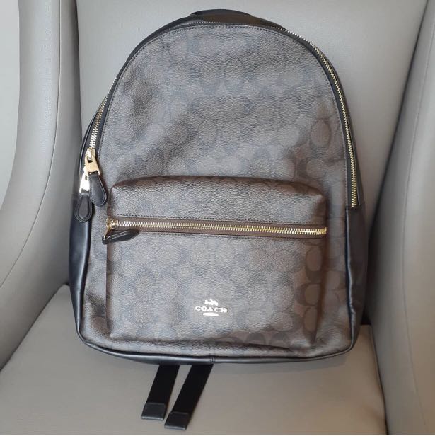 C Medium charlie backpack signature black, Men's Fashion, Bags