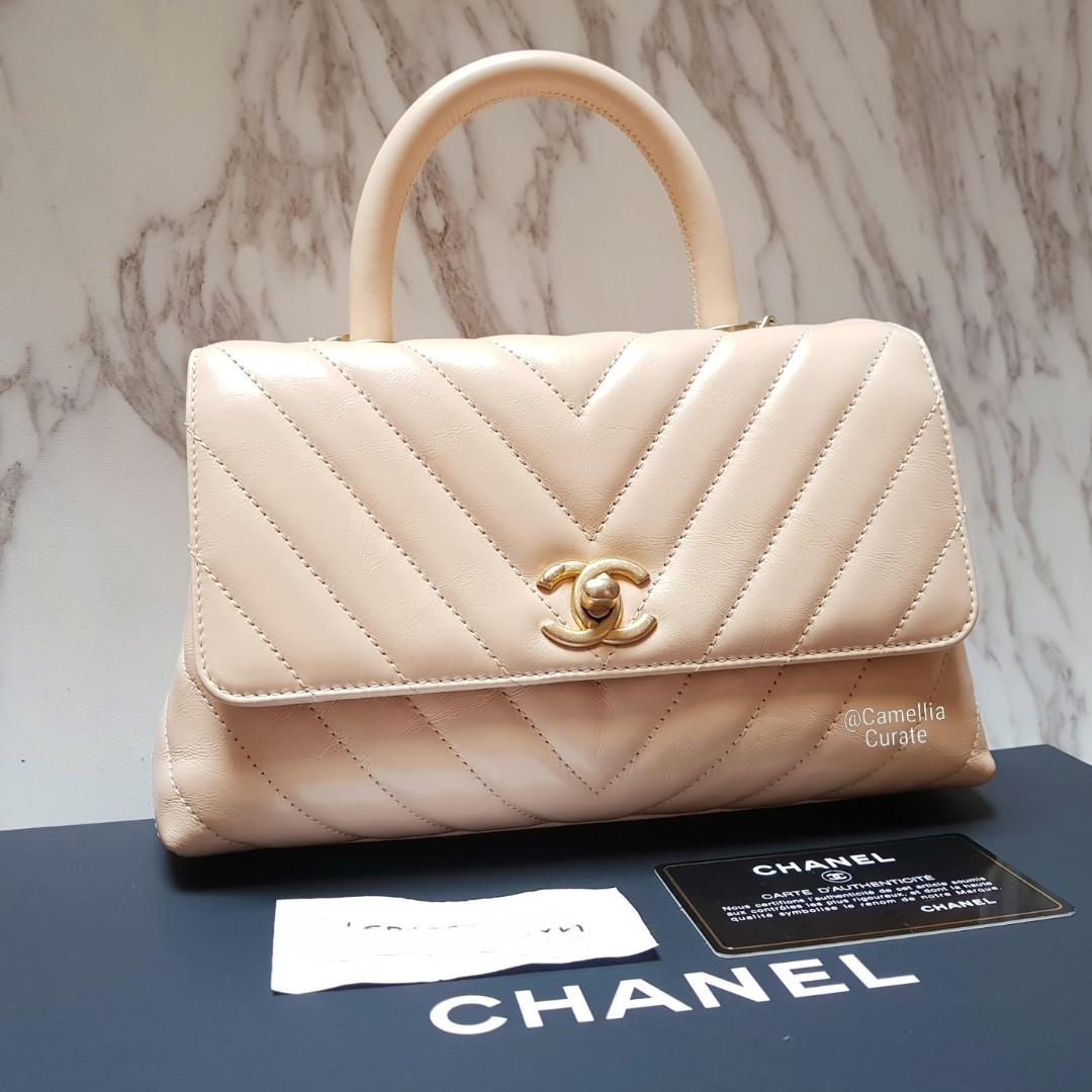 Chanel Coco Handle 20A Beige Chevron Caviar with light gold hardware