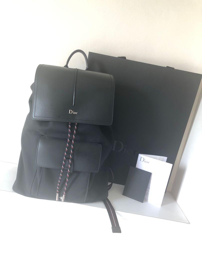 Black calfskin and black hotsell nylon backpack with red detailing
