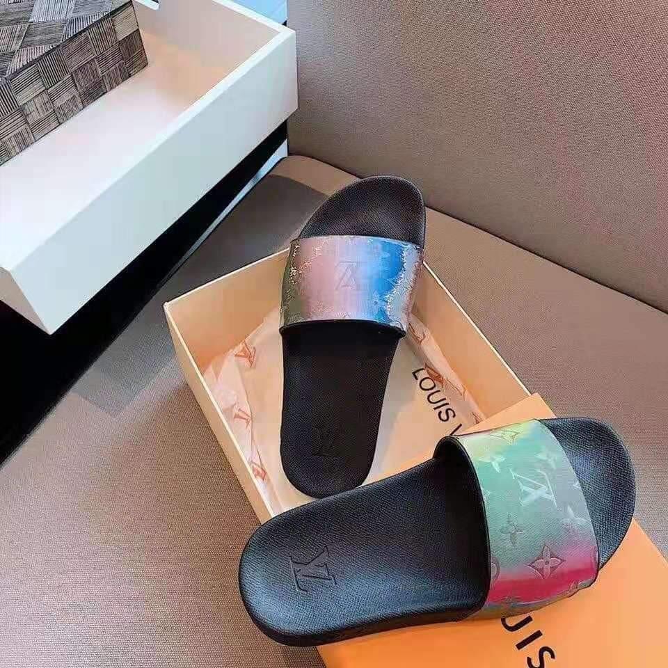 Louis Vuitton Slides white, Women's Fashion, Footwear, Flats & Sandals on  Carousell