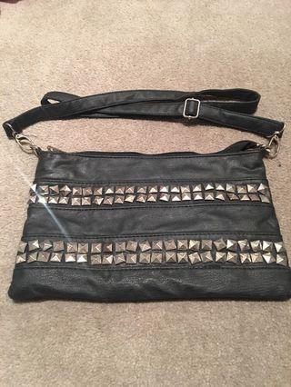 Leather stud sling bag
