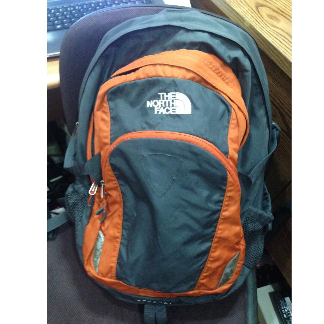 North Face Back pack (Category: Backpacks) located in Manila. Submitted by tinseyra (Listing ID 246725300, Image 1). Description: Original, With Laptop pocket, Color Orange/black. Slightly used.