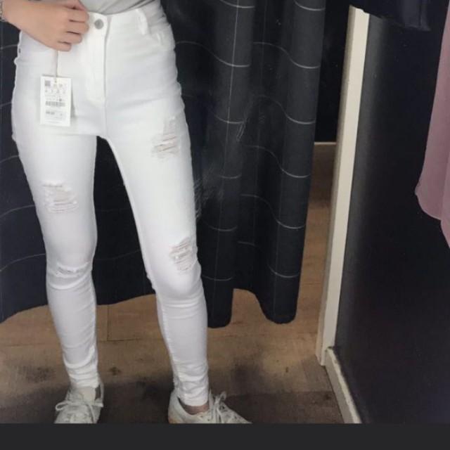 high waisted white ripped jeans