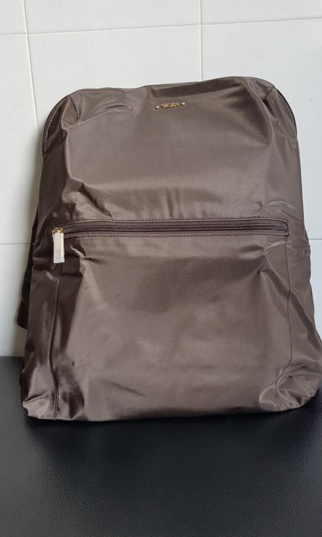 tumi backpack with trolley sleeve