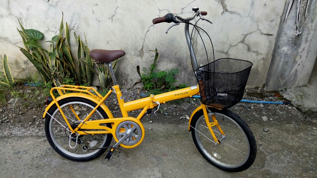 yellow folding bike