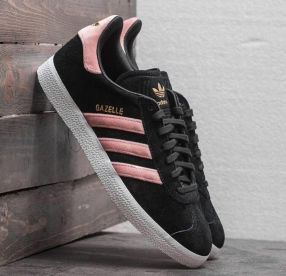 pink adidas with black stripes