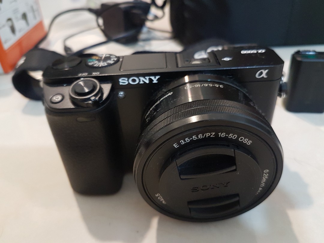 Sony A6000 + kit lens, Photography, Lens & Kits on Carousell