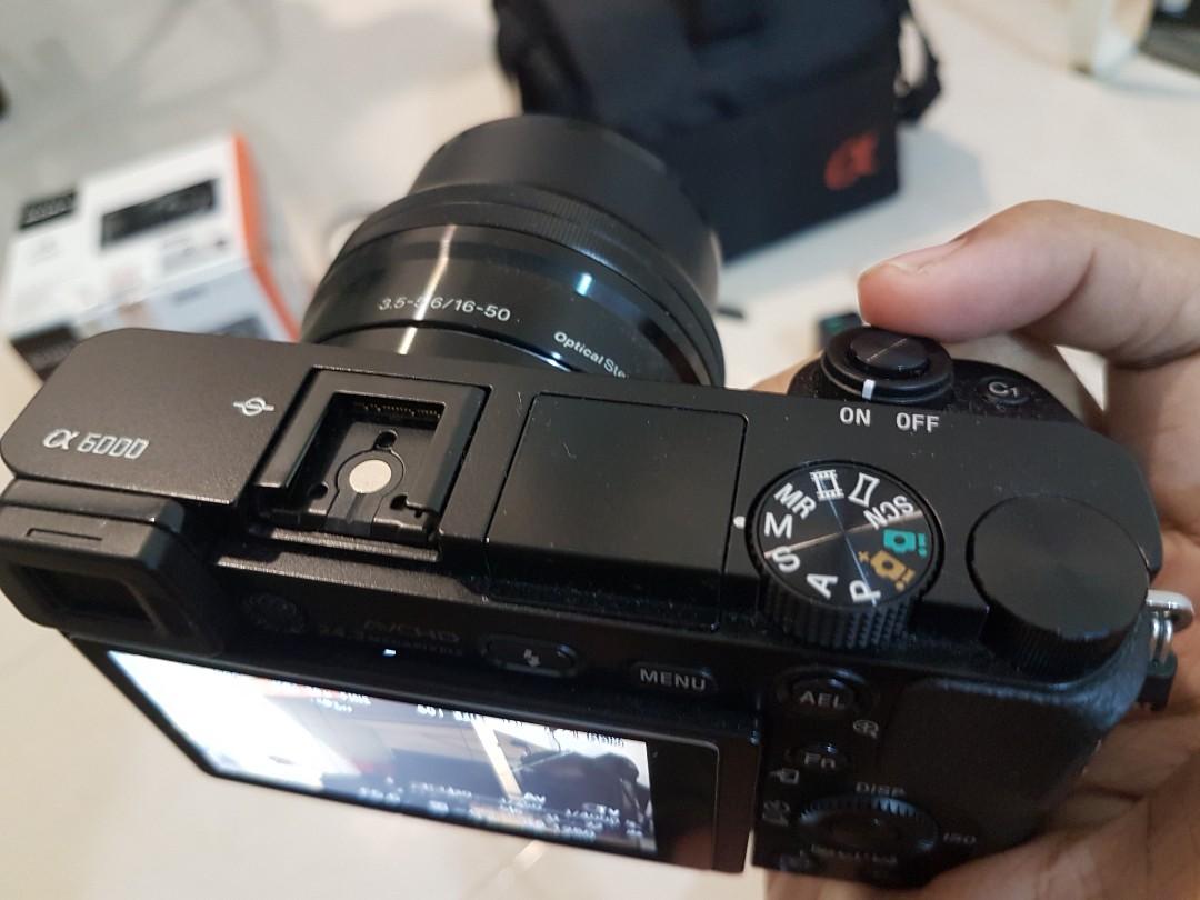 Sony A6000 + kit lens, Photography, Lens & Kits on Carousell