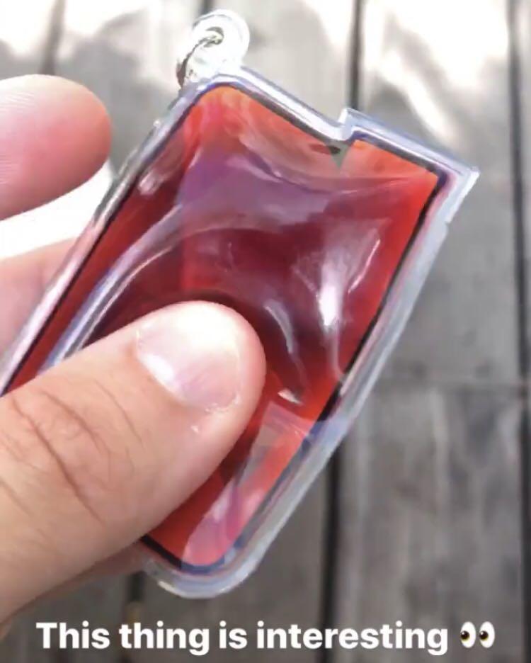 supreme jug keychain