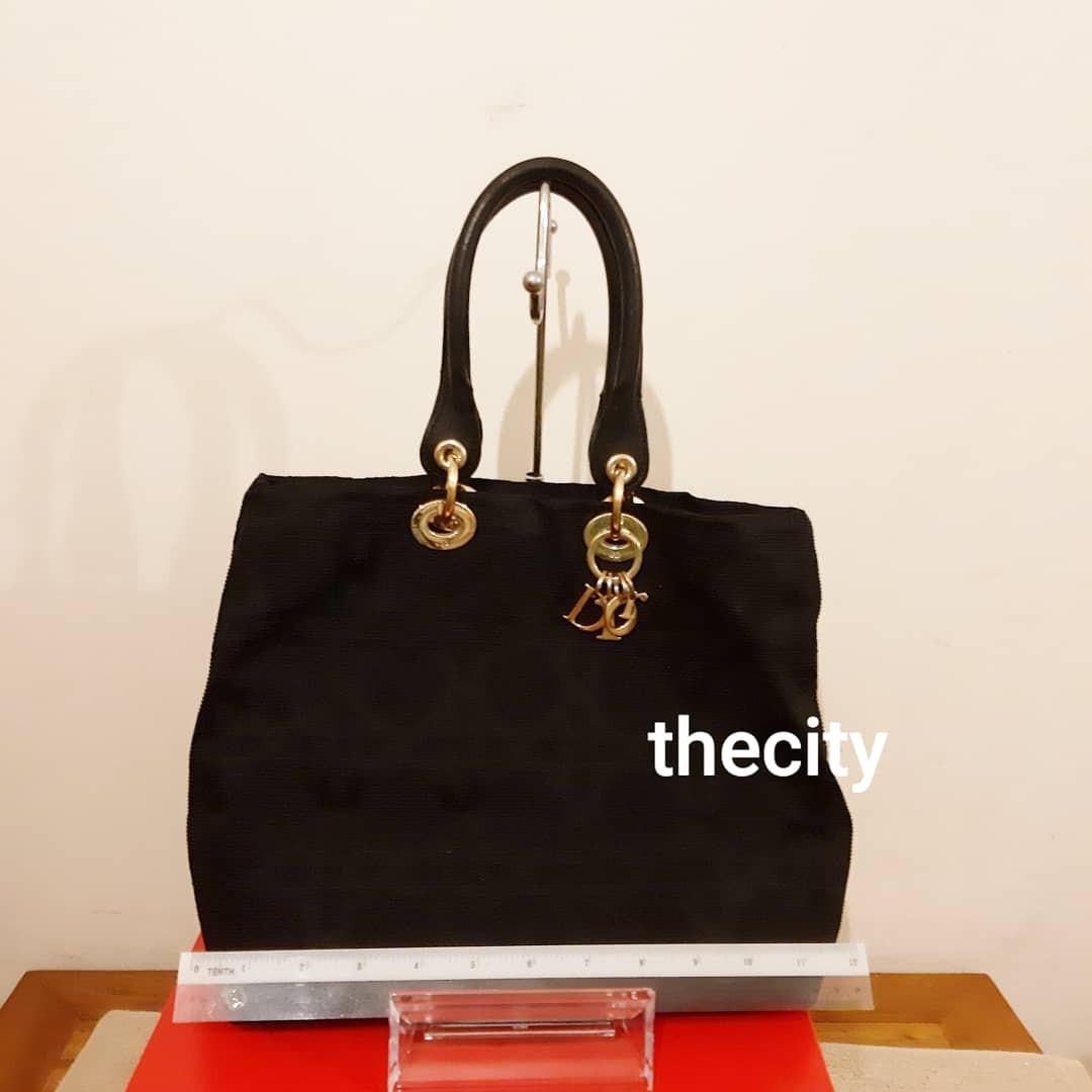 How to clean dior canvas bag shop