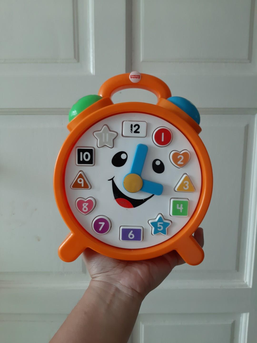 fisher price clock laugh and learn