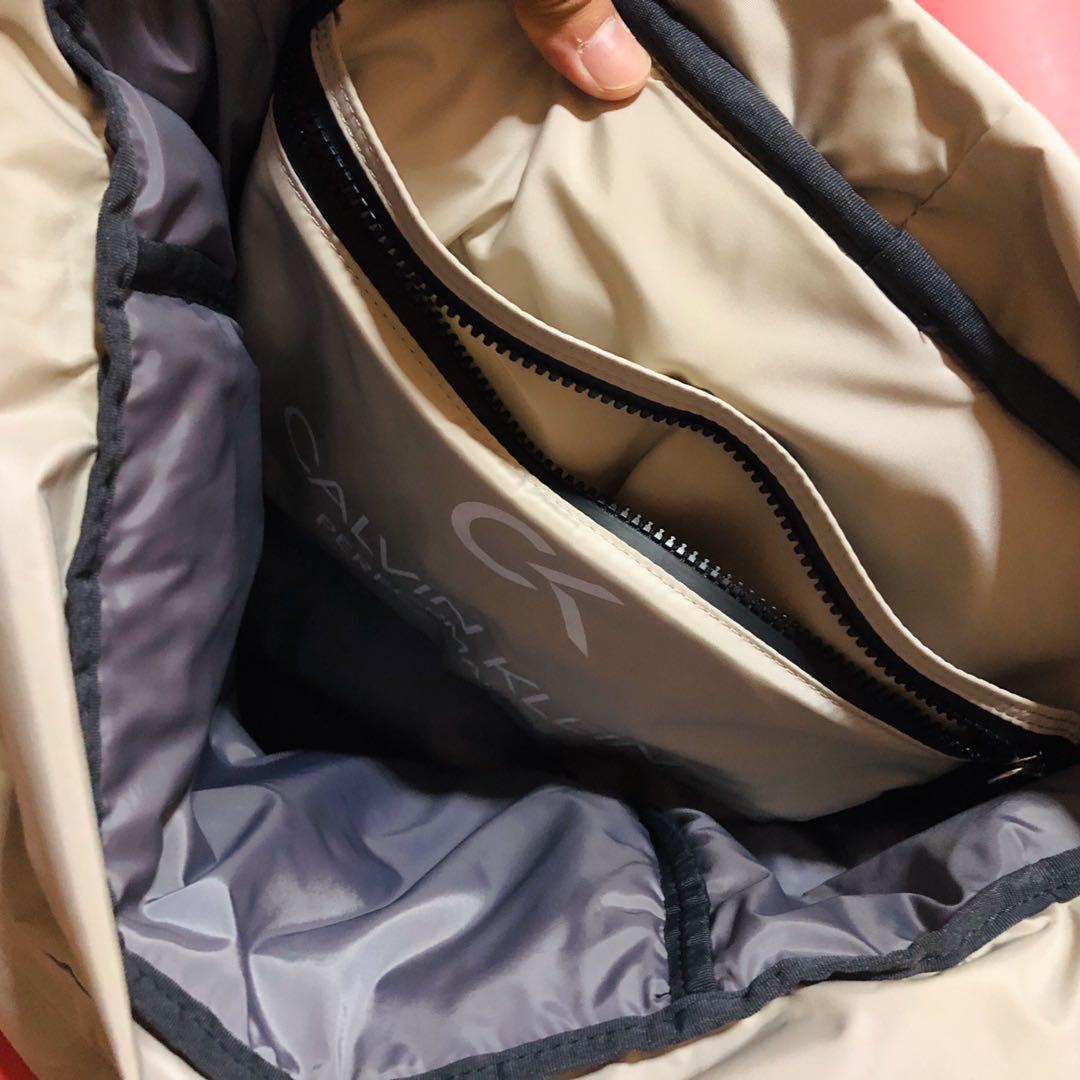 CK Performance Backpack (Category: Backpacks) located in Singapore. Submitted by baloo (Listing ID 247756233, Image 3). Description: Colour: Beige / Orange / 3m Reflective Strip Bag was bought from Tangs Scott Road Condition 10/10 Used 3 times for school. Bag is new. Bought August 2019. Selling because not utilised. DM me for any more info about the bag. ___________________________________________________________________________________ DETAILS D