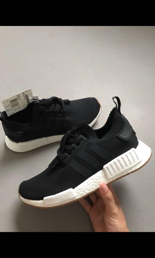 Nmd black gum sole store