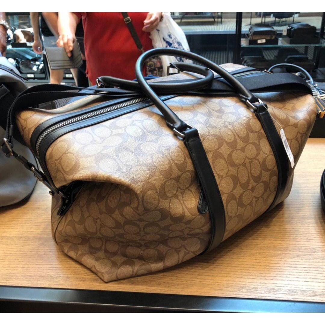 coach overnight bag in signature canvas