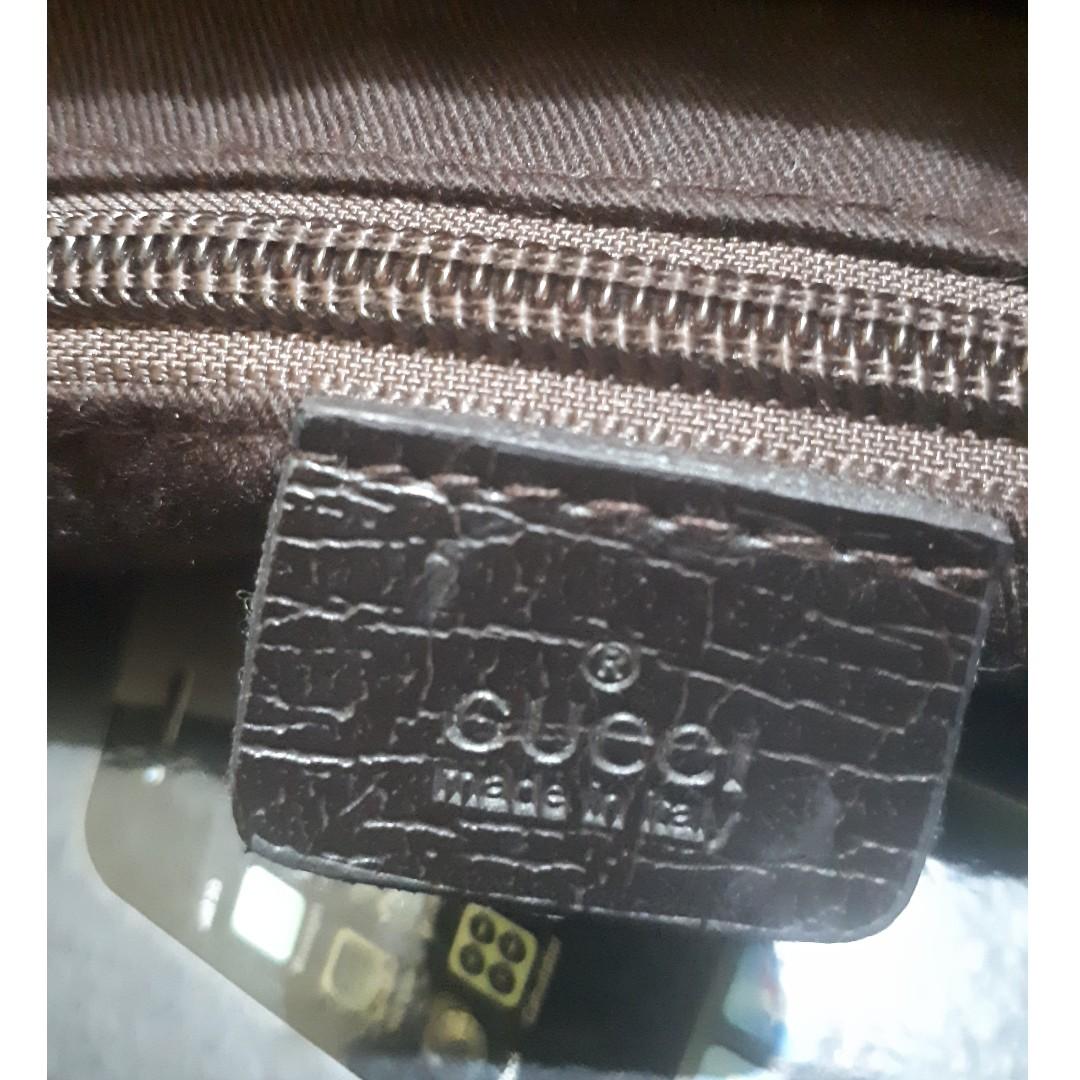 Gucci pouch top serial number