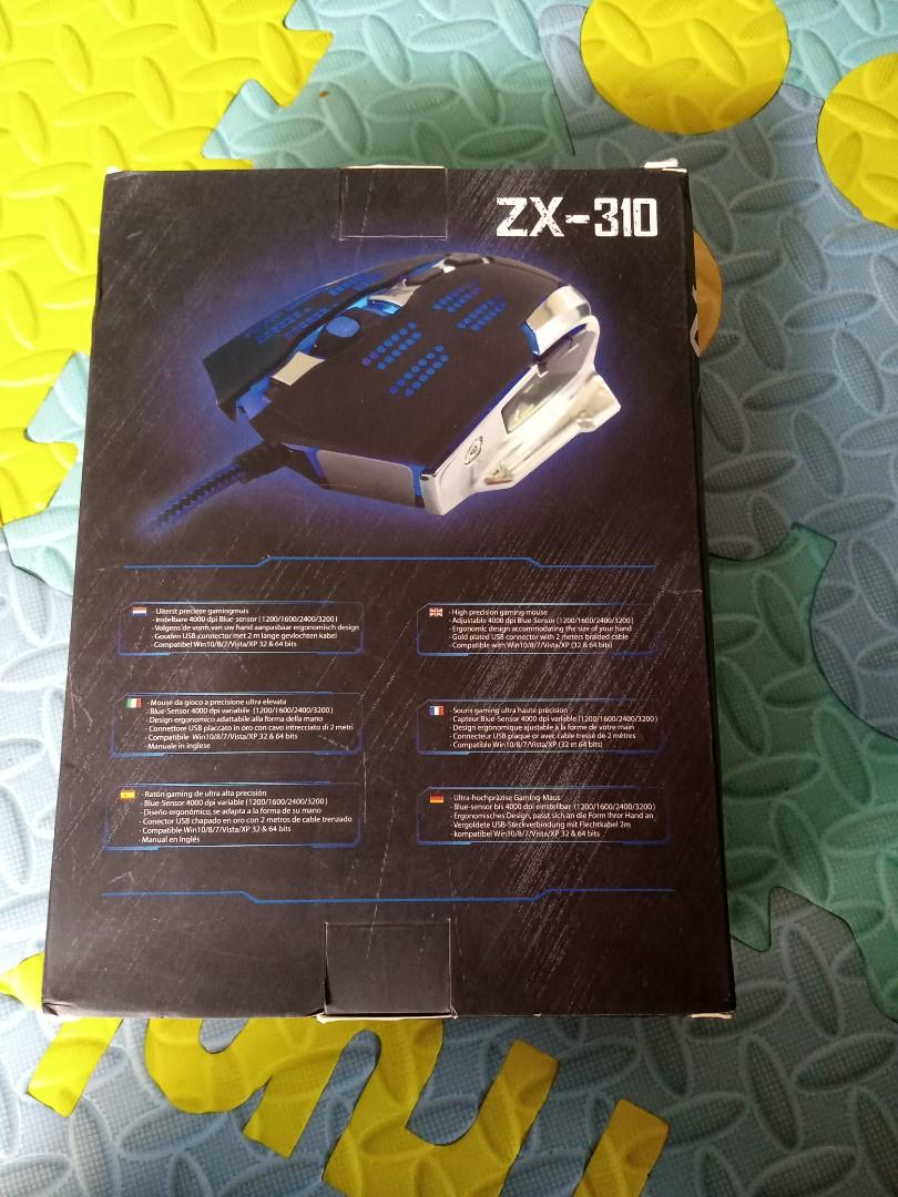Gaming Mouse (Category: Mouse & Mousepads) located in Cainta. Submitted by lsashop (Listing ID 248249985, Image 2). Description: Zeus ZX-310 Professional 9D Gaming Mouse with heavy metal bottom.