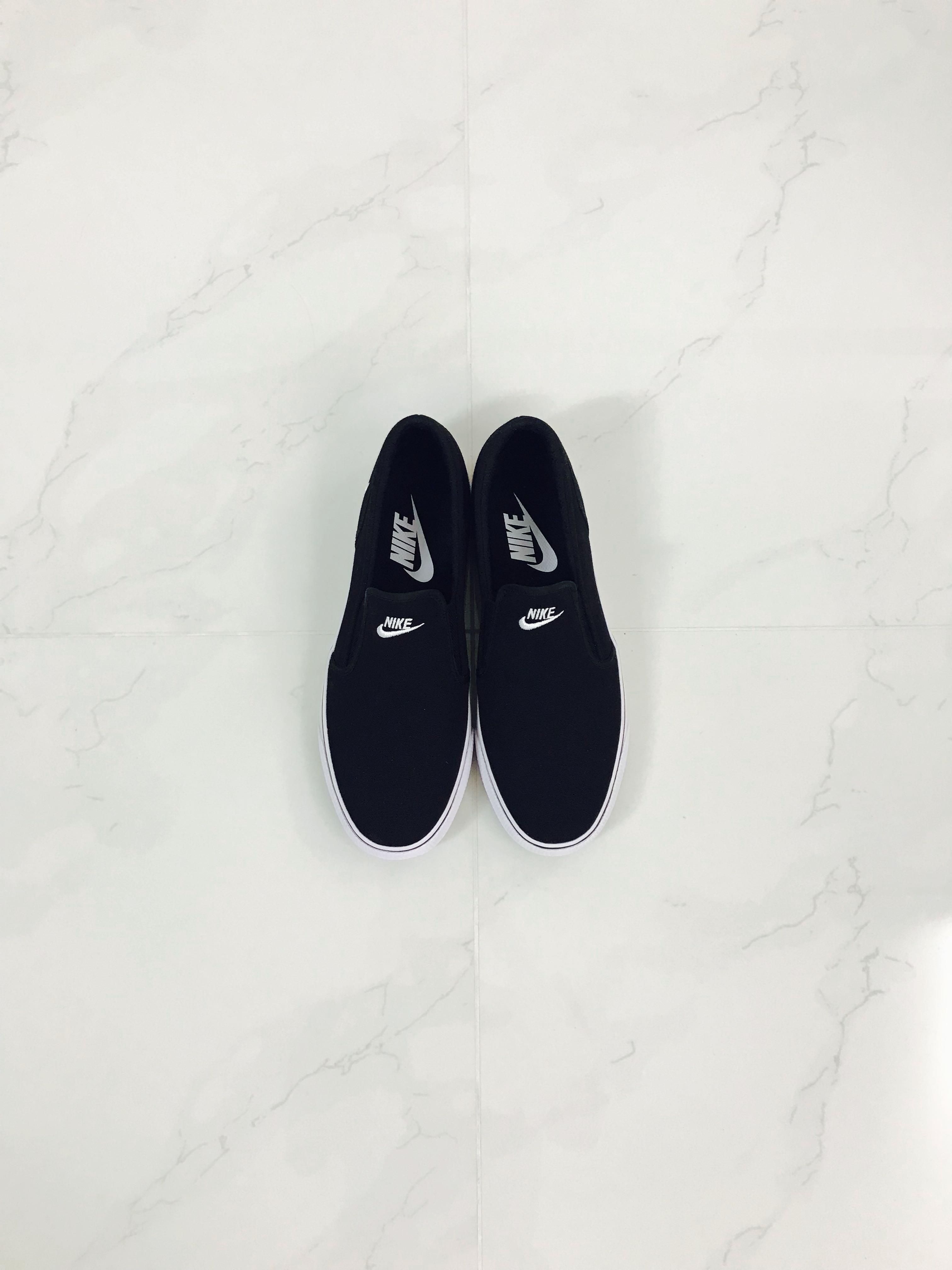 nike toki slip on price