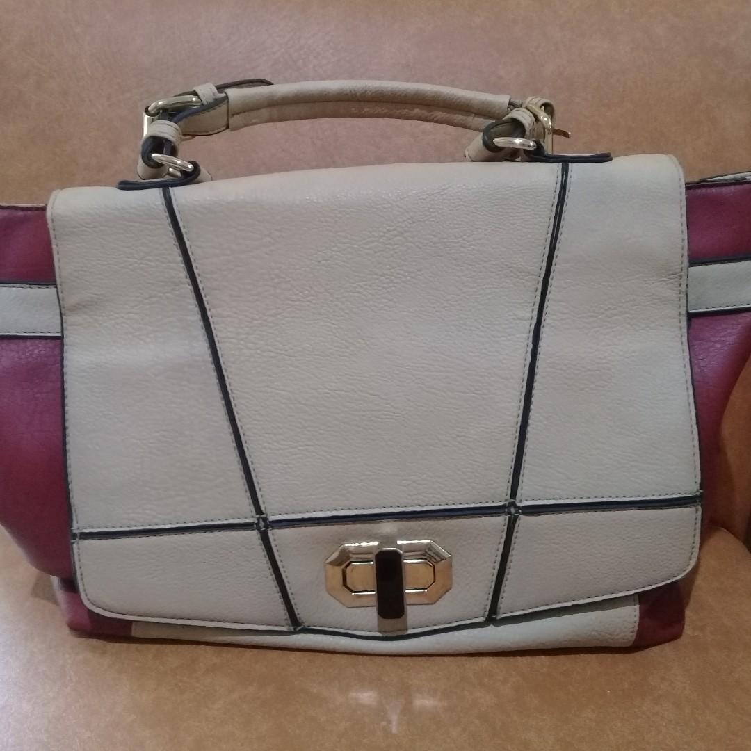 Tomato Sling Satchel Bag (Category: Cross-body Bags) located in Cebu City. Submitted by roxyyap (Listing ID 248318879, Image 1). Description: (with sling strap) Very thick leather. Very durable. Minimal flaws..