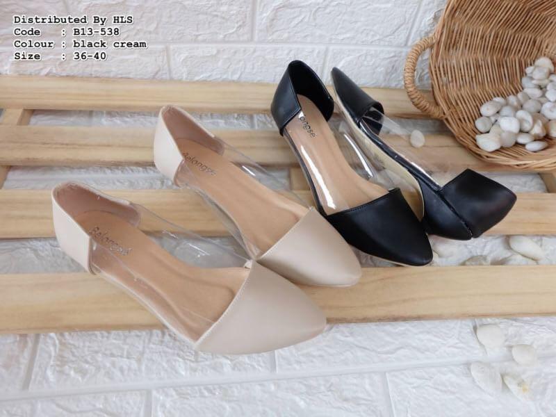 black and cream court shoes