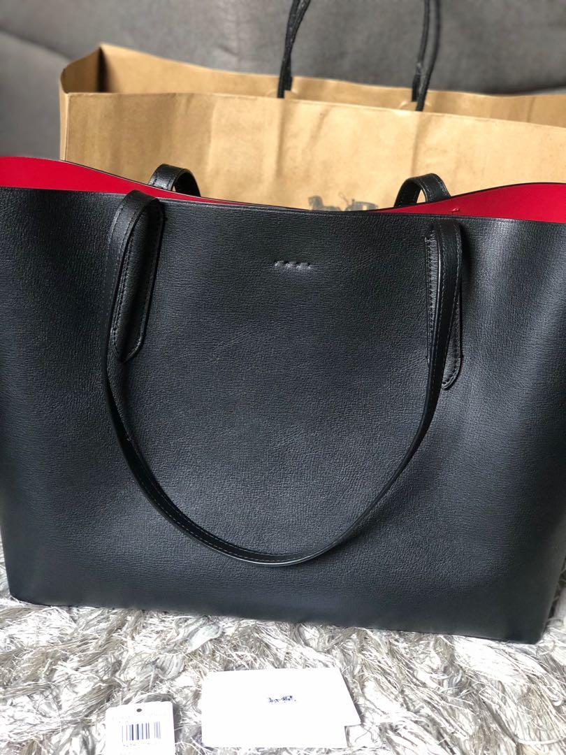 Coach black tote red inside on sale